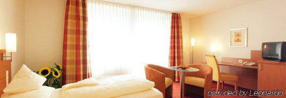 Akzent Hotel Wersetuerm'Ken Munique Quarto foto